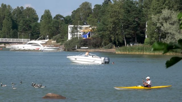 People do watersports during record heatwave in Helsinki Finland