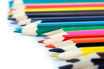 colored pencils drawing multicolored on white background