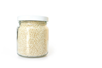 white sesame seed in jar on white background