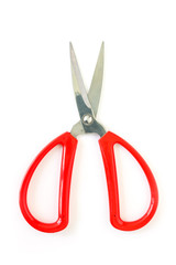 red scissors cutting on white background