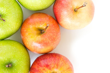 red apple and green apple on white background