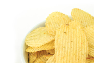 crispy potato chips junk food unhealthy food on bowl white background
