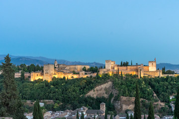 Fototapeta na wymiar The magnificient Alhambra of Granada, Spain. Alhambra fortress at sunset viewed from Mirador de San Nicolas.