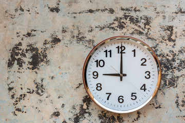 classic style clock on old and dirty wall with copy space for text.