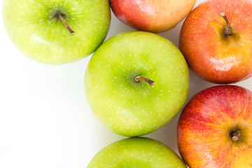 red apple and green apple on white background