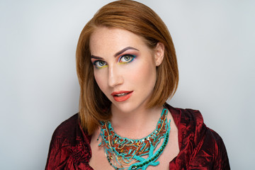 woman orange hair bob