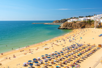 view on sandy beach in Albufeira , Algarve , Portugal
