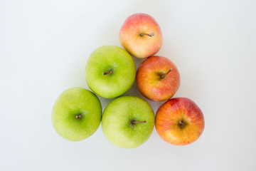red apple and green apple on white background