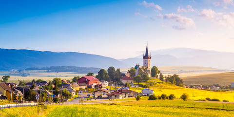 Beautiful landscape of valley in Slovakia mountains, small houses in village, rural scene. Spissky...