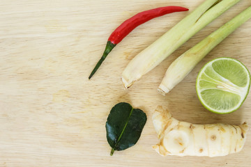 ingredients tom yom goong, lemongrass, galangal, kaffir lime leaves, lime, chili, thai food herbs nature background