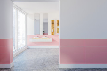 Double sink in white and pink bathroom