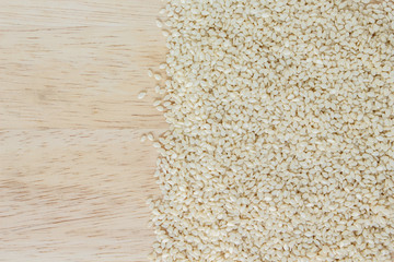 white sesame seed on wood background