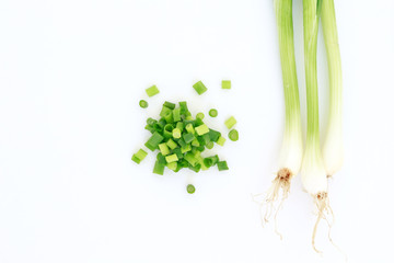 green onion cutted chives nature food on white background - obrazy, fototapety, plakaty