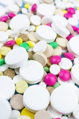 pills on a blue background