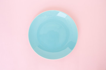 blue plate empty on pink rose quartz and serenity background