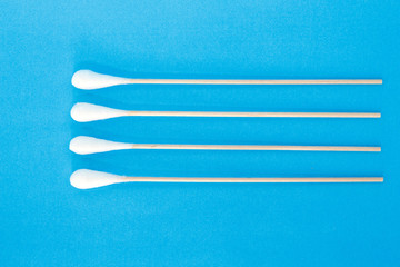 cotton bud, swab clean healthcare top view on blue background