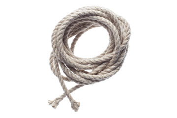 Roll of thin natural rope, isolated on white background