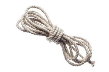 Roll of thin natural rope, isolated on white background