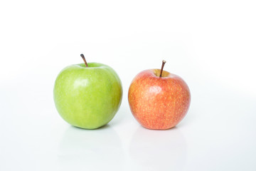 red apple and green apple on white background