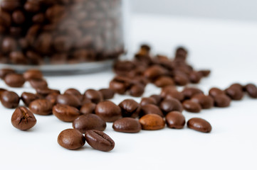 Scattered coffee beans close up