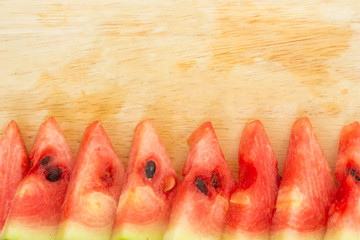watermelon red slice on wood background