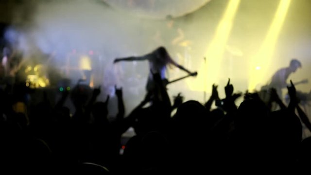 Rock star acclamation at music concert event. Heavy metal band performs a rock concert at the club. the artist bows to the audience