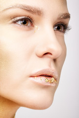 Closeup macro beauty portrait of young woman face