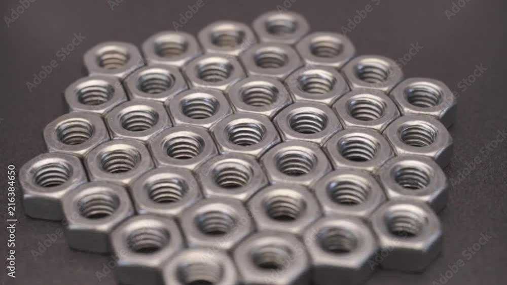 Poster Screw-nut rotation 360 degrees. Macro view.
