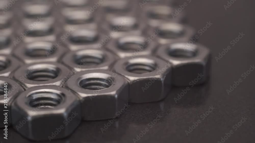Poster Screw-nut rotation 360 degrees. Macro view.