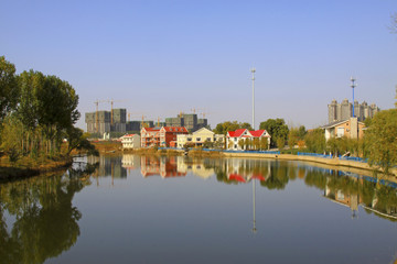 Fototapeta premium lake and architecture landscape in a park