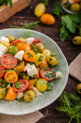 Fototapeta na wymiar Fresh tomato olives salad feta cheese