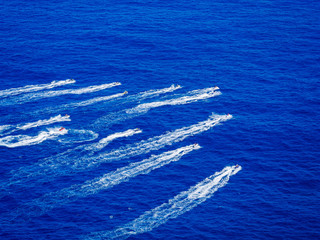 et ski race in the ocean. Top down view