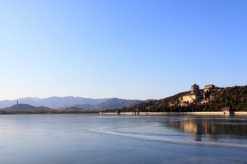 Fototapeta premium Tower of Buddhist incense and frozen Kunming lake