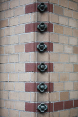 Brick wall with decorative elements - flowers