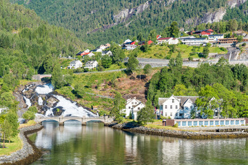 Fototapeta premium Waterfall at the mouth of the fjord