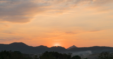 Bright sunset in sky over Loei province Thailand landscape