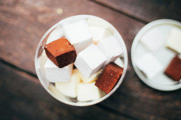 Fototapeta na wymiar Delicious Homemade Marshmallows - Chocolate, Papaya, Vanilla and Berry