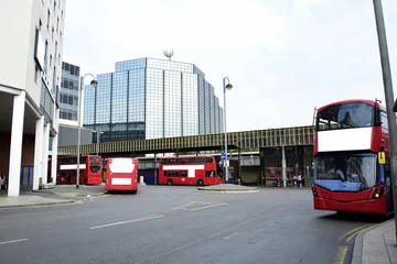 Poster Double Decker red bus is running on road in London © suman