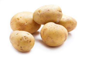 Young potatoes isolated on white background