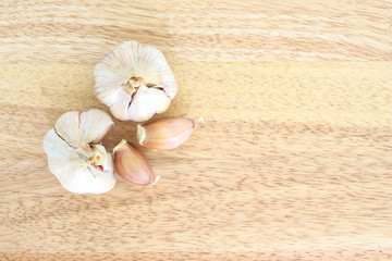 garlic vegetable ingredient food top view on wood background