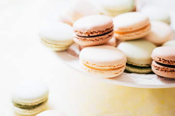 Homemade French Macaroons on the Plate, Pistachio, Coffee and Vanilla Macaroons, Beautiful Wallpaper