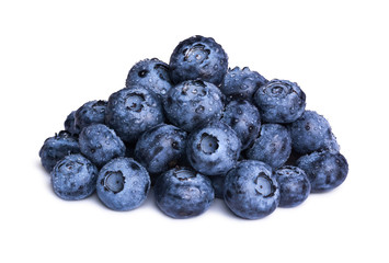 Group of fresh blueberries with leaves isolated on white background