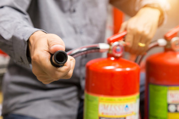 Engineer inspection Fire extinguisher in control room.