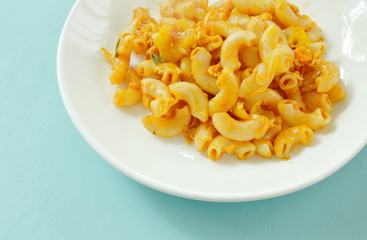 stir fried macaroni and egg with ketchup on plate
