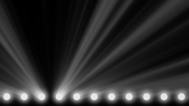 Animation of stage lights frame. Bright shiny stage lights flashing movement entertainment spotlight projectors in the dark, blue soft light spotlight strike on black background. Spotlights and