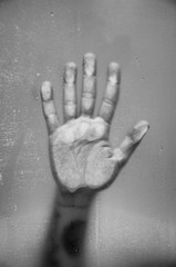 Hand Held Up Against Steamed Glass - obrazy, fototapety, plakaty