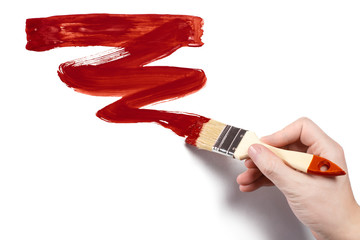Hand painting using a thick red brush, isolated on white background