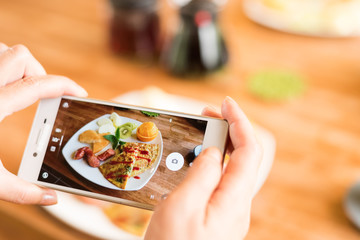 taking photo at breakfast