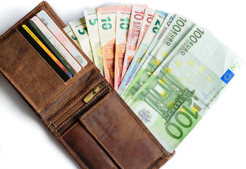 Euro banknotes coming out from the wallet