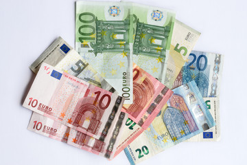 Obraz na płótnie Canvas Euro banknotes on a pile